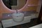 Bagno mobile sospeso con lavabo tondo